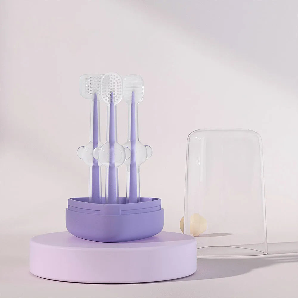 Blue silicone pet toothbrush with soft bristles and ergonomic handle for dog and cat dental care.