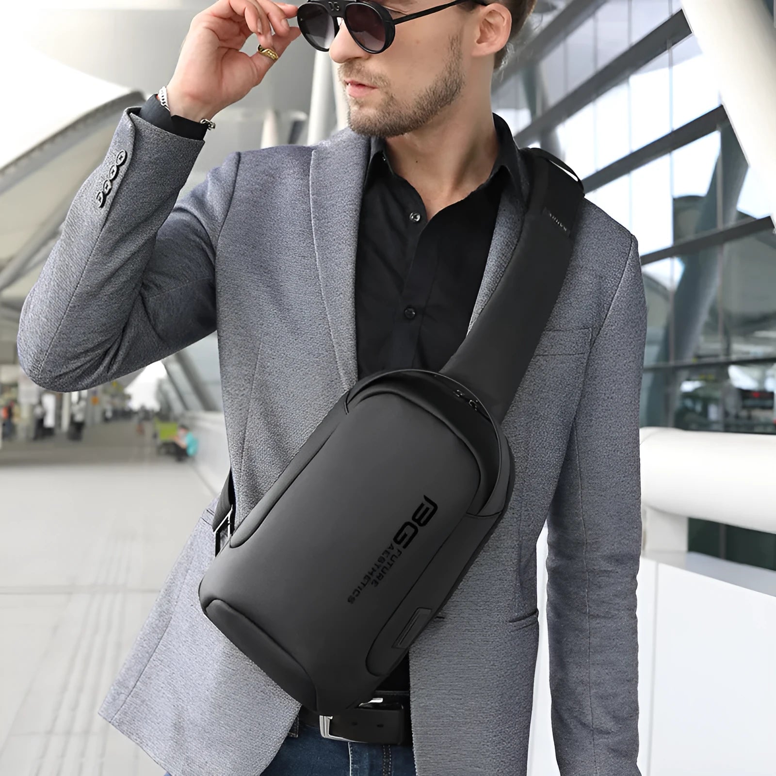 Men's blue oxford cloth business shoulder bag with USB charging port showing letter detailing