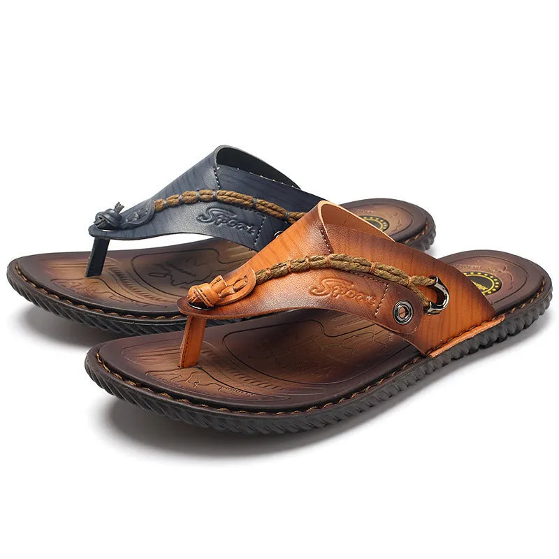Men's dark blue herringbone pattern outdoor slippers with leather lining and a rubber sole.