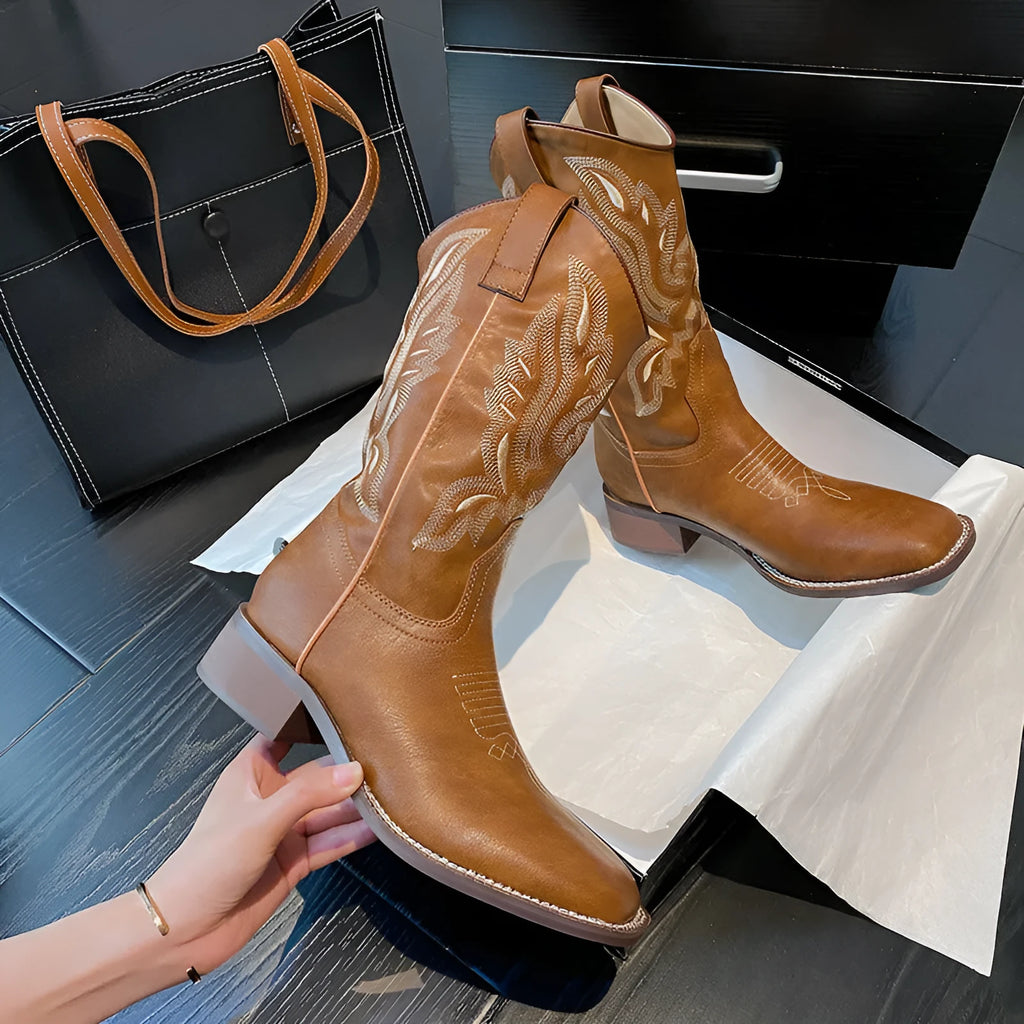 Brown women's embroidered Martin boots with mid-calf length, square heel, and round toe