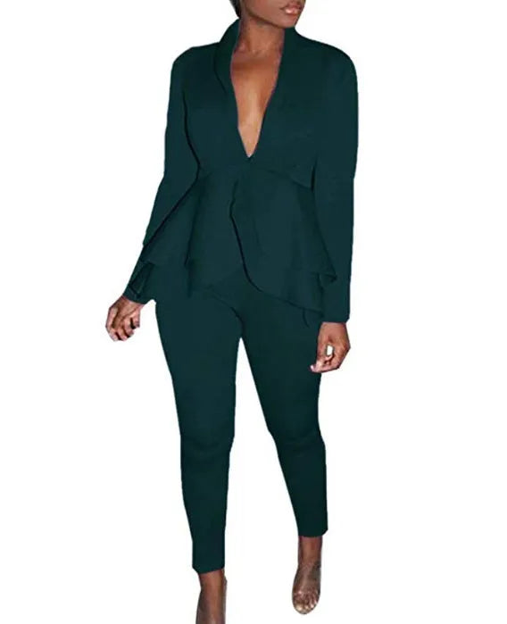 White ruffled business casual shirt and matching pencil pants set laid flat.