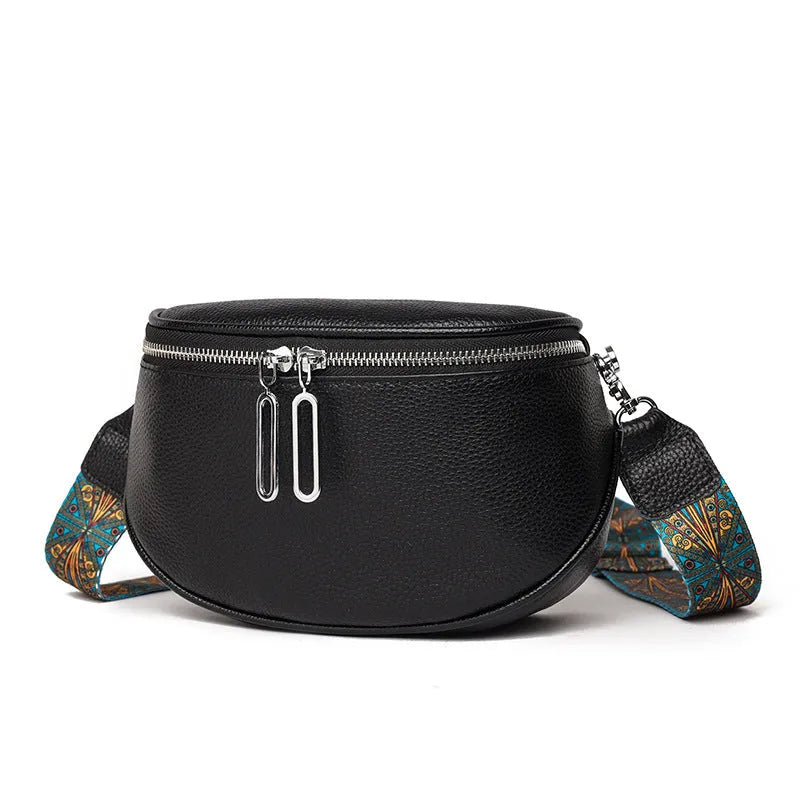 Women's soft black leather saddle-shaped crossbody messenger bag with a zip pocket.