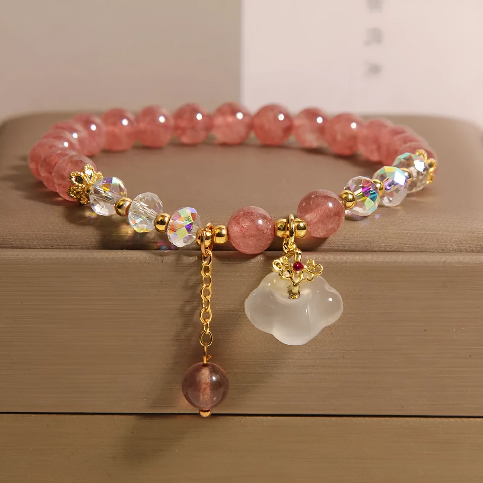 Women's adjustable strawberry quartz and white agate crystal bracelet with auspicious clouds pattern