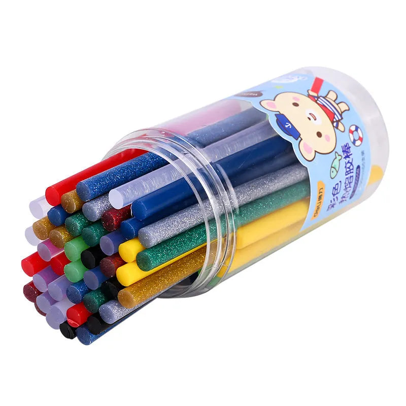 Pack of 55 transparent hot melt glue sticks measuring 7mm in diameter.