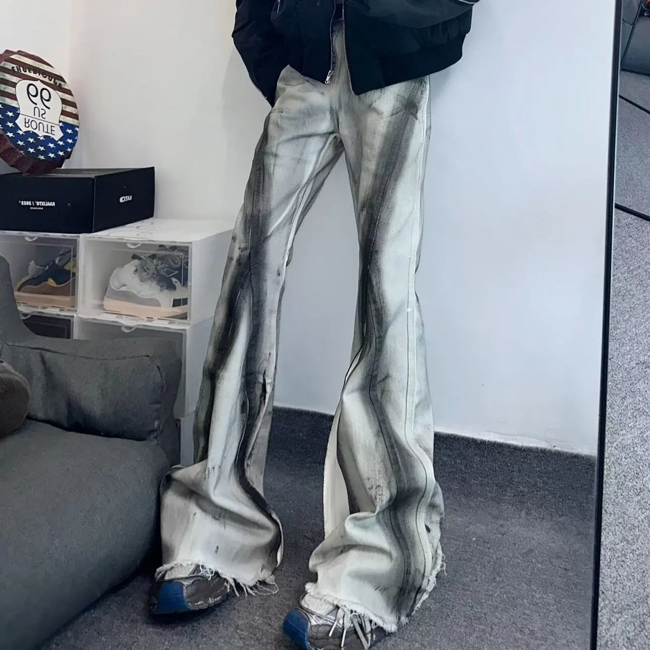 White denim jeans with black ribbon gradient detailing and heavy rough selvedge construction