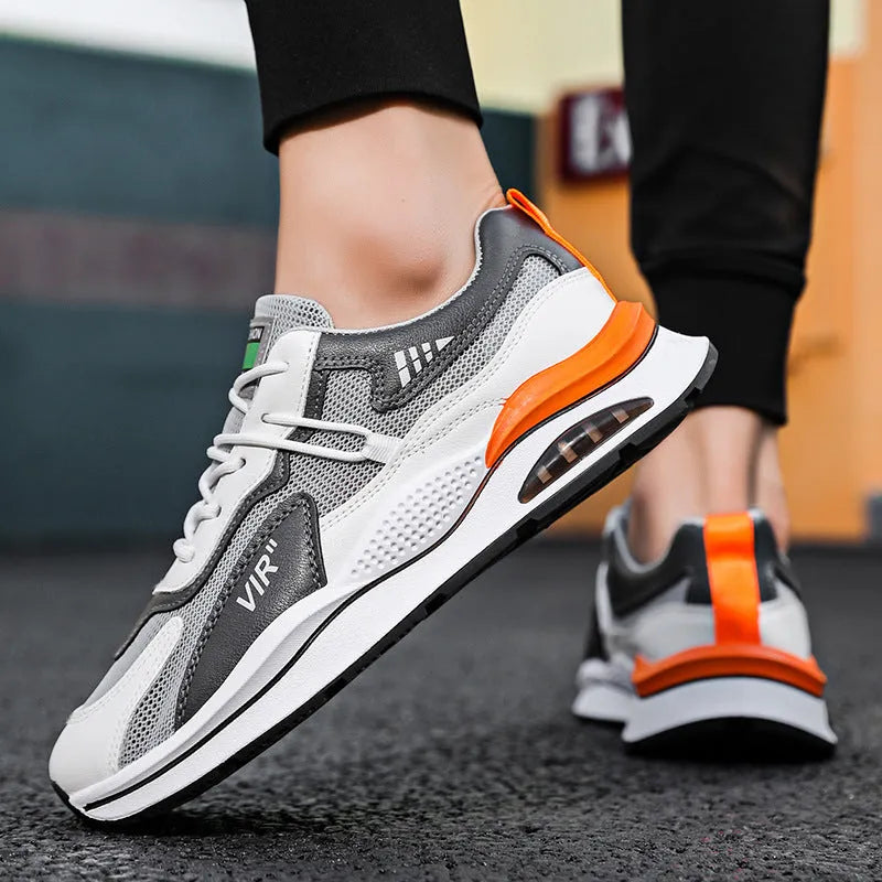 Men's grey breathable mesh casual trainers with a round toe and lightweight EVA sole.