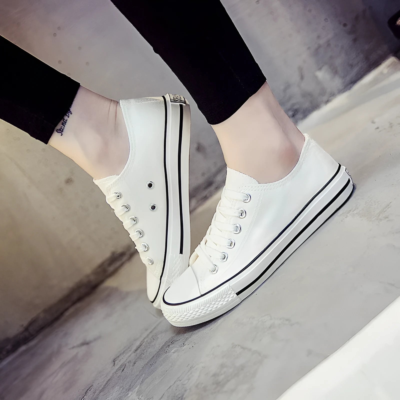 Women's solid colour canvas casual flat shoes on a plain background.
