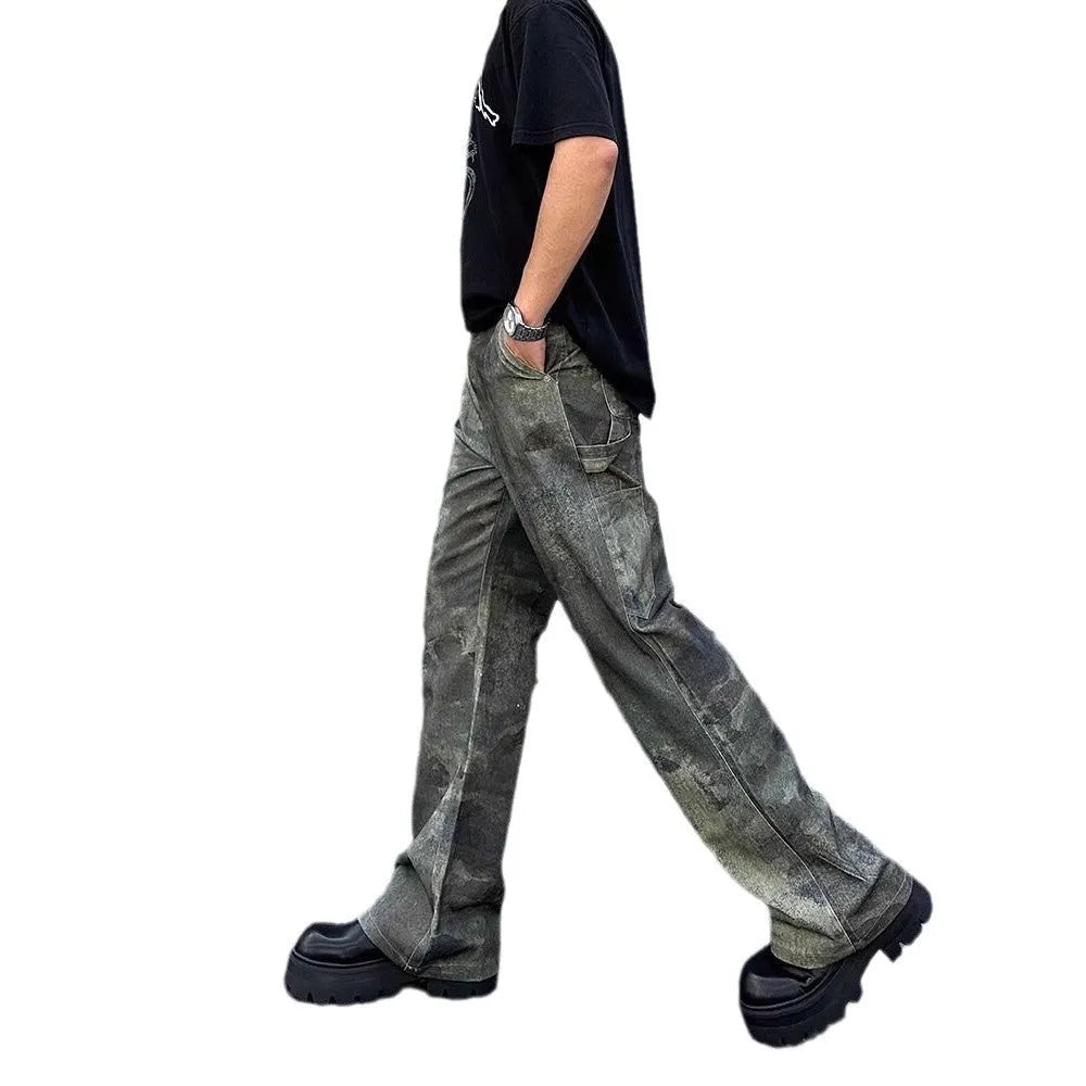 Men's straight leg jeans in a retro digital camouflage pattern on blue denim