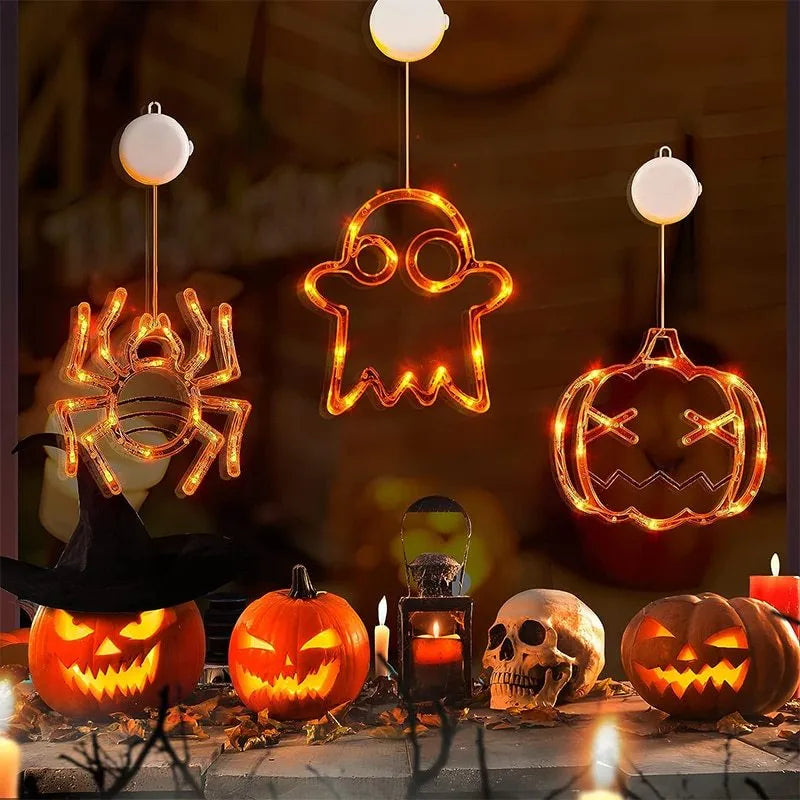 Halloween window hanging LED lights set with seven designs including spiders, pumpkins, and ghosts
