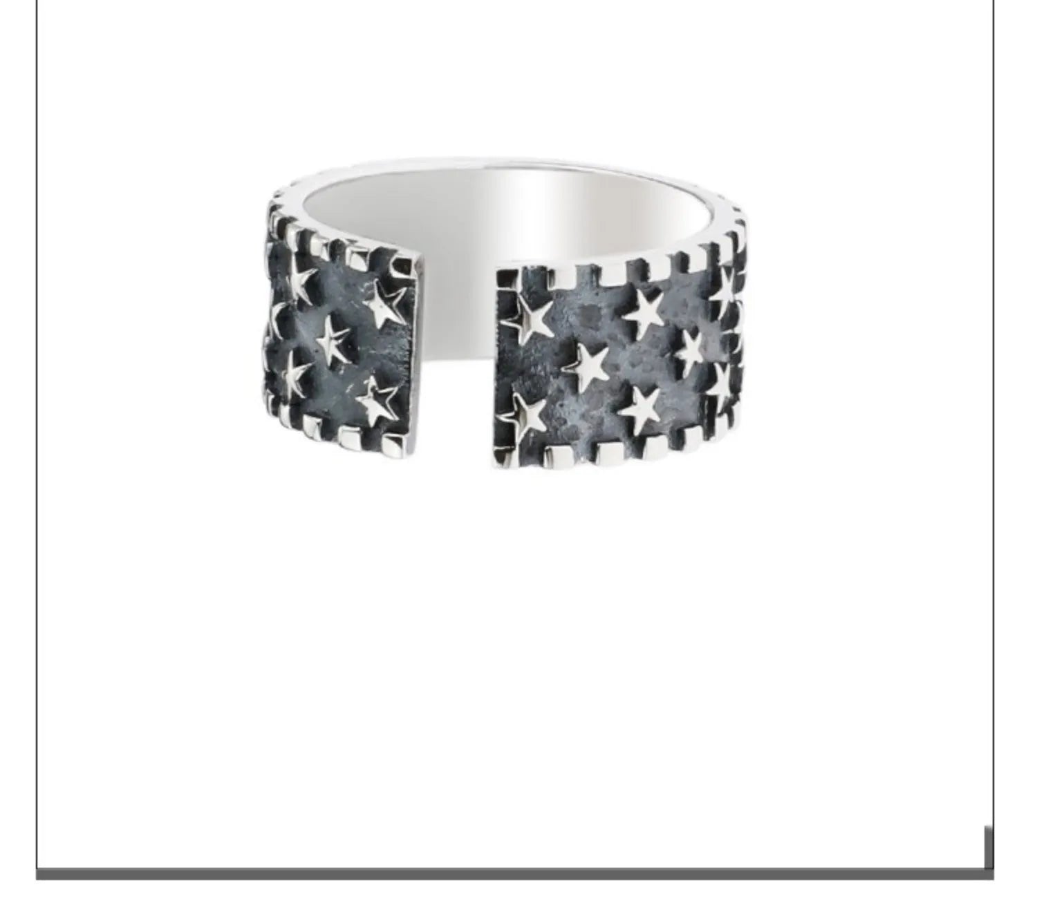 Adjustable open-ended sterling silver ring with a multi five-pointed star geometric pattern.