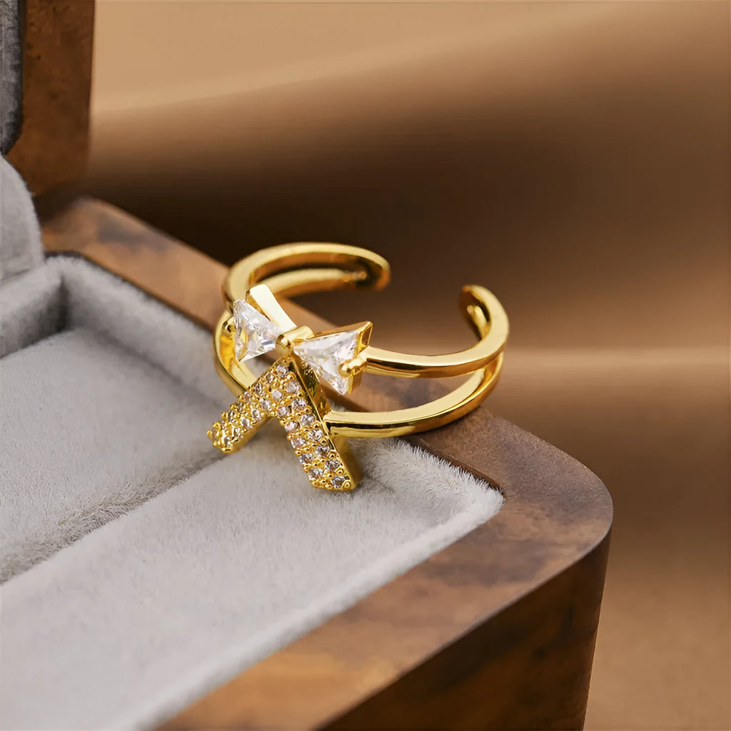 Women's open geometric fashion ring in electroplated gold colour on a copper base.