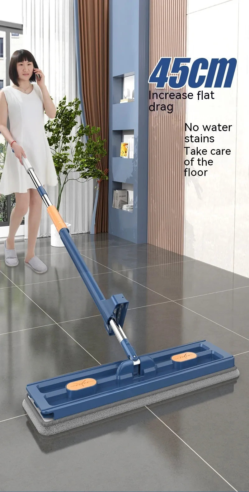 Large flat mop with blue cloth and long stainless steel handle showing 360-degree rotating head.