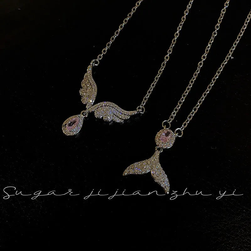 Women's S925 sterling silver fishtail pendant necklace on O-ring chain with geometric design