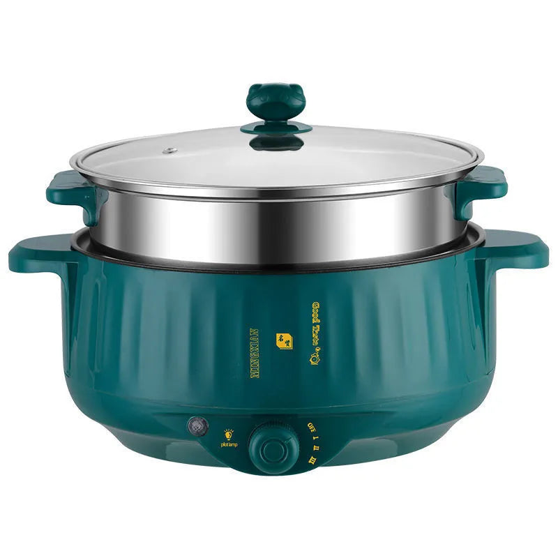 White electric multi-function hot pot with non-stick integrated cooking pot on a kitchen counter.