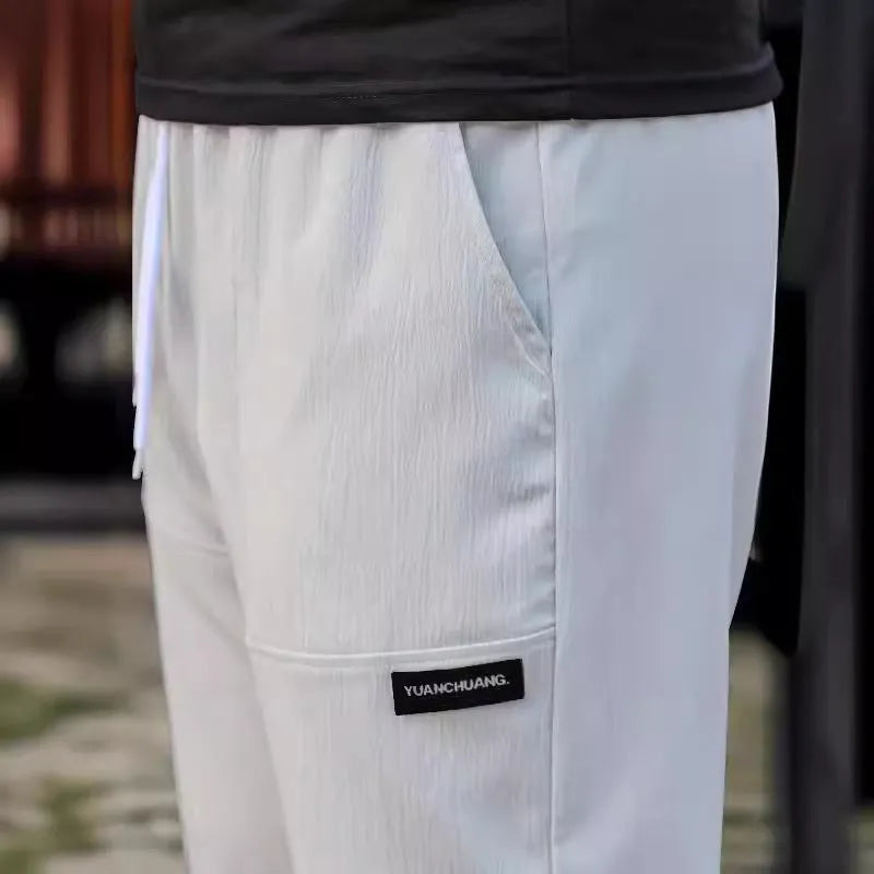 Men's comfortable trousers in polyester fibre available in multiple colours for spring and autumn wear
