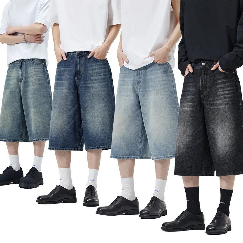 Men's light blue denim shorts with a straight-leg, cropped cut on a casual background.