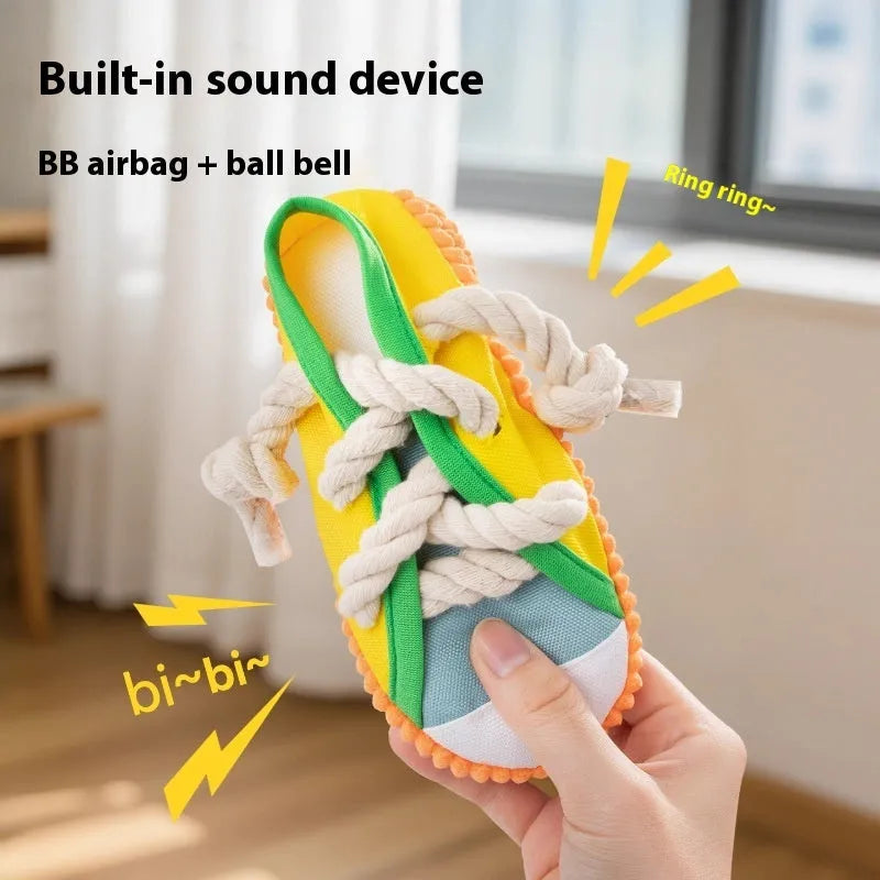 Plastic dog slipper chew toy with squeaker in yellow, black, or blue colour options