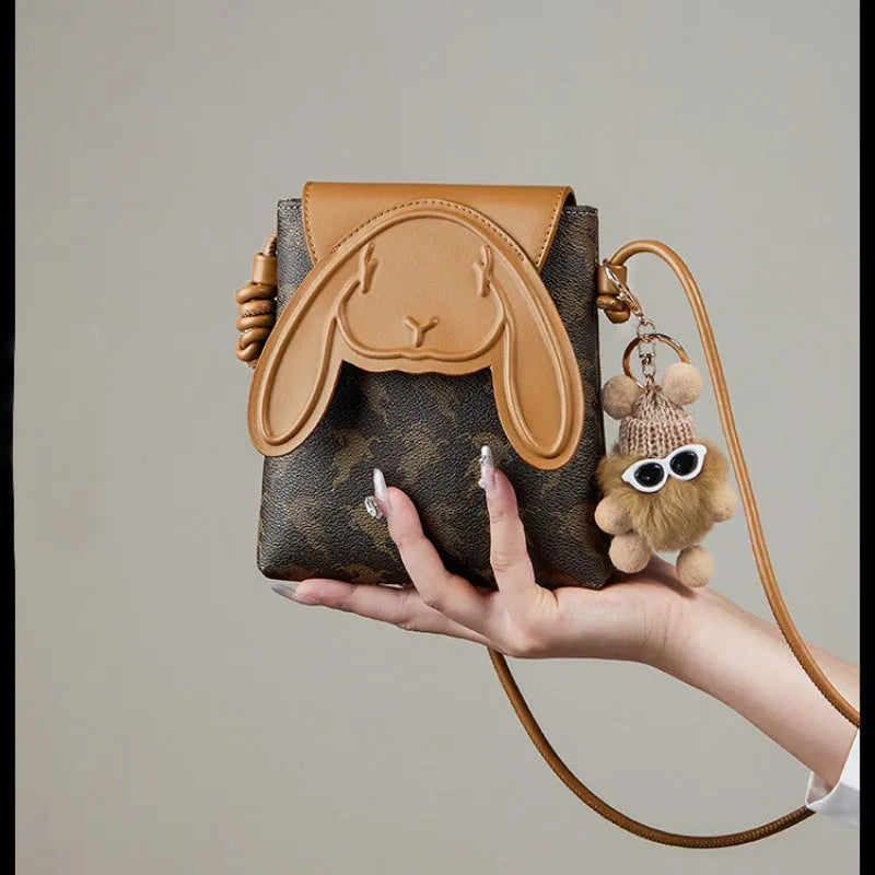 coffee colour crossbody phone bag with pom-pom pendant PU material vertical square shape open pockets