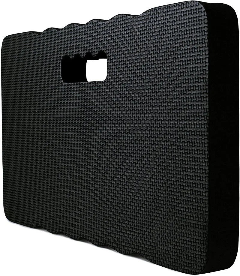 Solid blue EVA foam garden kneeler pad on soil for comfortable planting and weeding.