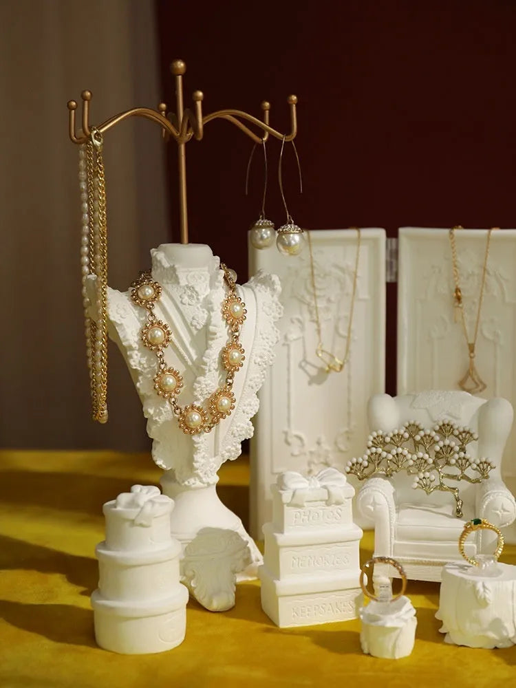White plaster gypsum jewelry display stand with three layers and retro shape for necklace photography