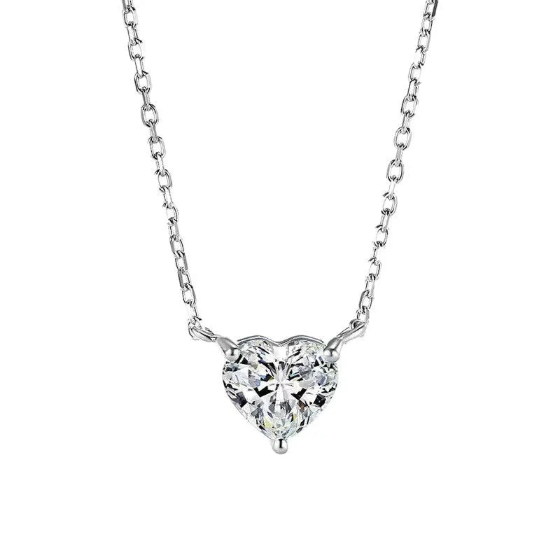 Silver women's heart necklace with simple refined design on copper chain