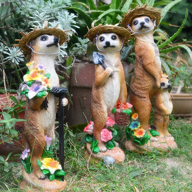 Straw hat mongoose garden ornament figurine in resin plastic.