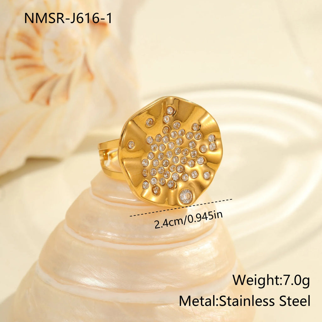 Geometric stainless steel open mouth ring with pleated inlaid design and crystal accents
