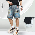 Blue men's ripped denim shorts with graffiti details and a straight leg opening.