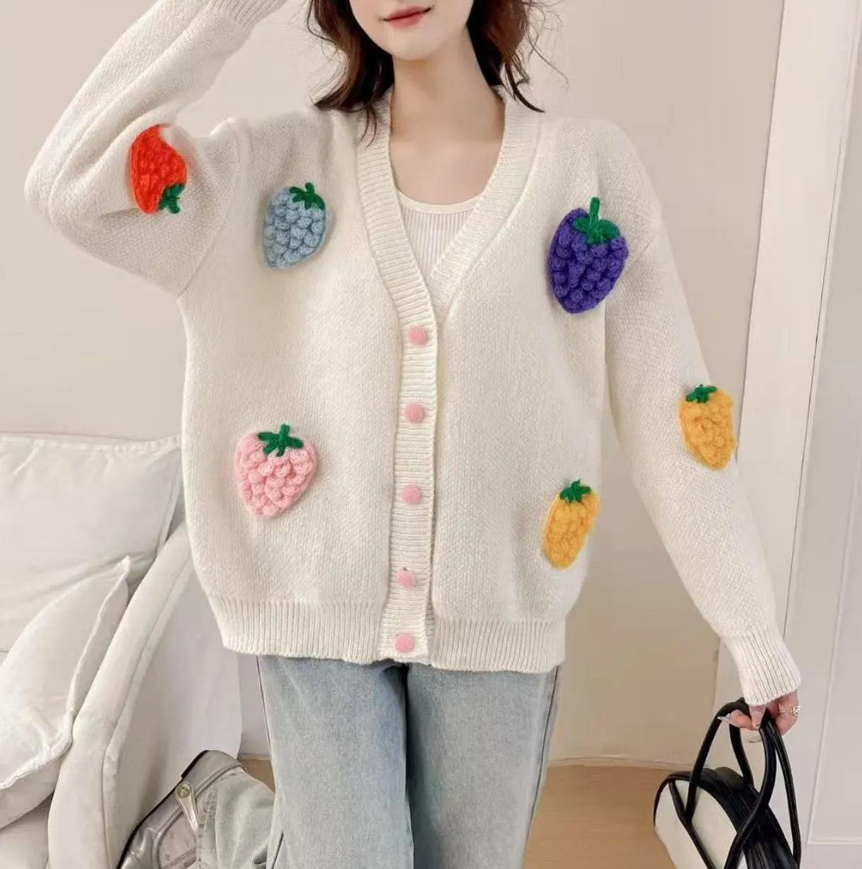 Handmade embroidery thick knit cardigan in light blue with loose fit and long sleeves