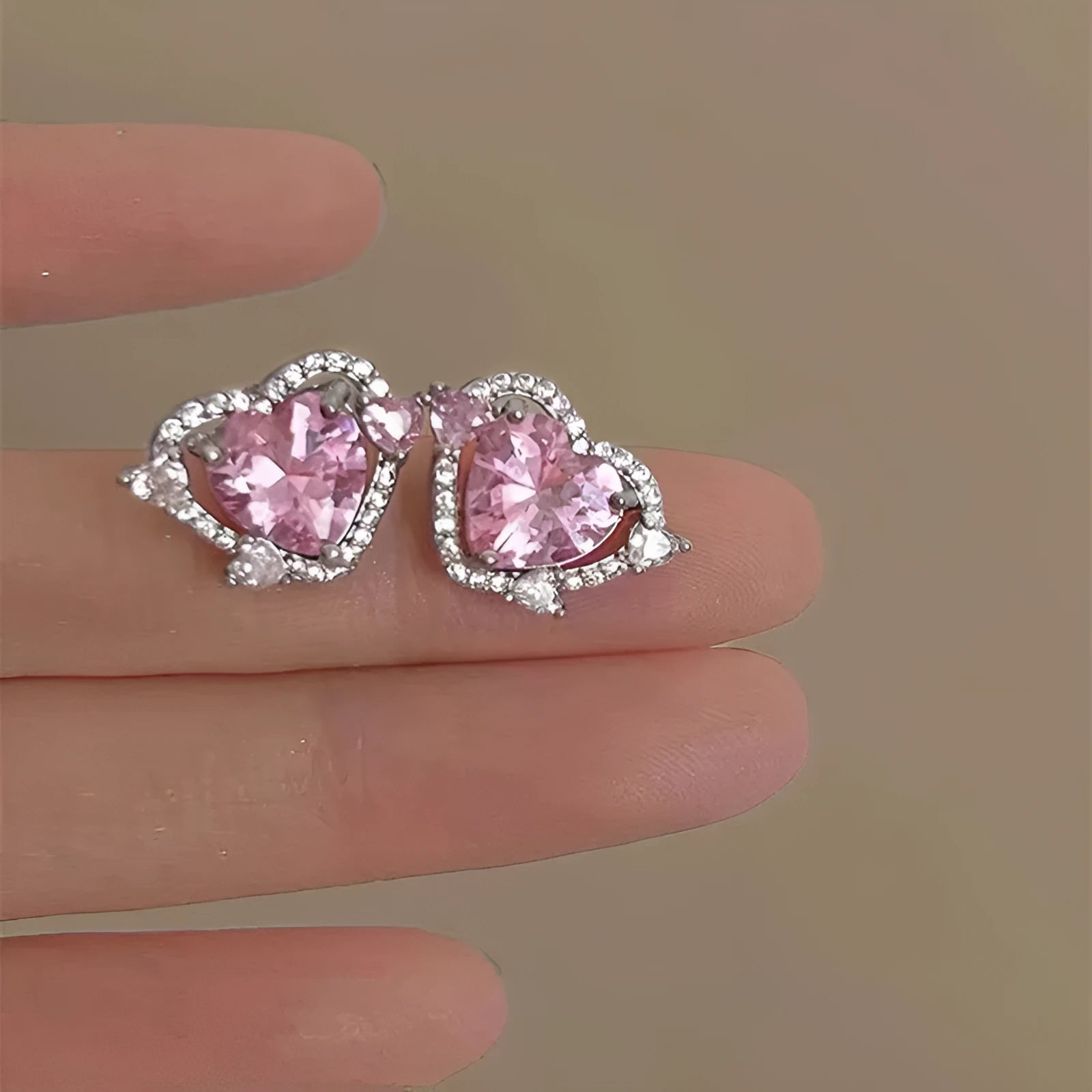 Guardian Heart Stud Earrings with white gold-coloured electroplated finish and heart shape design