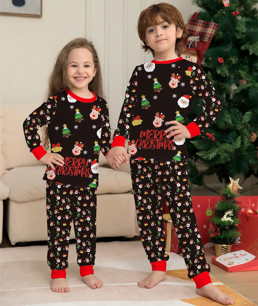 Matching red plaid and cartoon print Christmas pyjamas set for adults, children and a dog on a festive background.