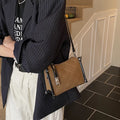 Women's diamond plaid PU shoulder messenger bag in black with double straps and lock detail