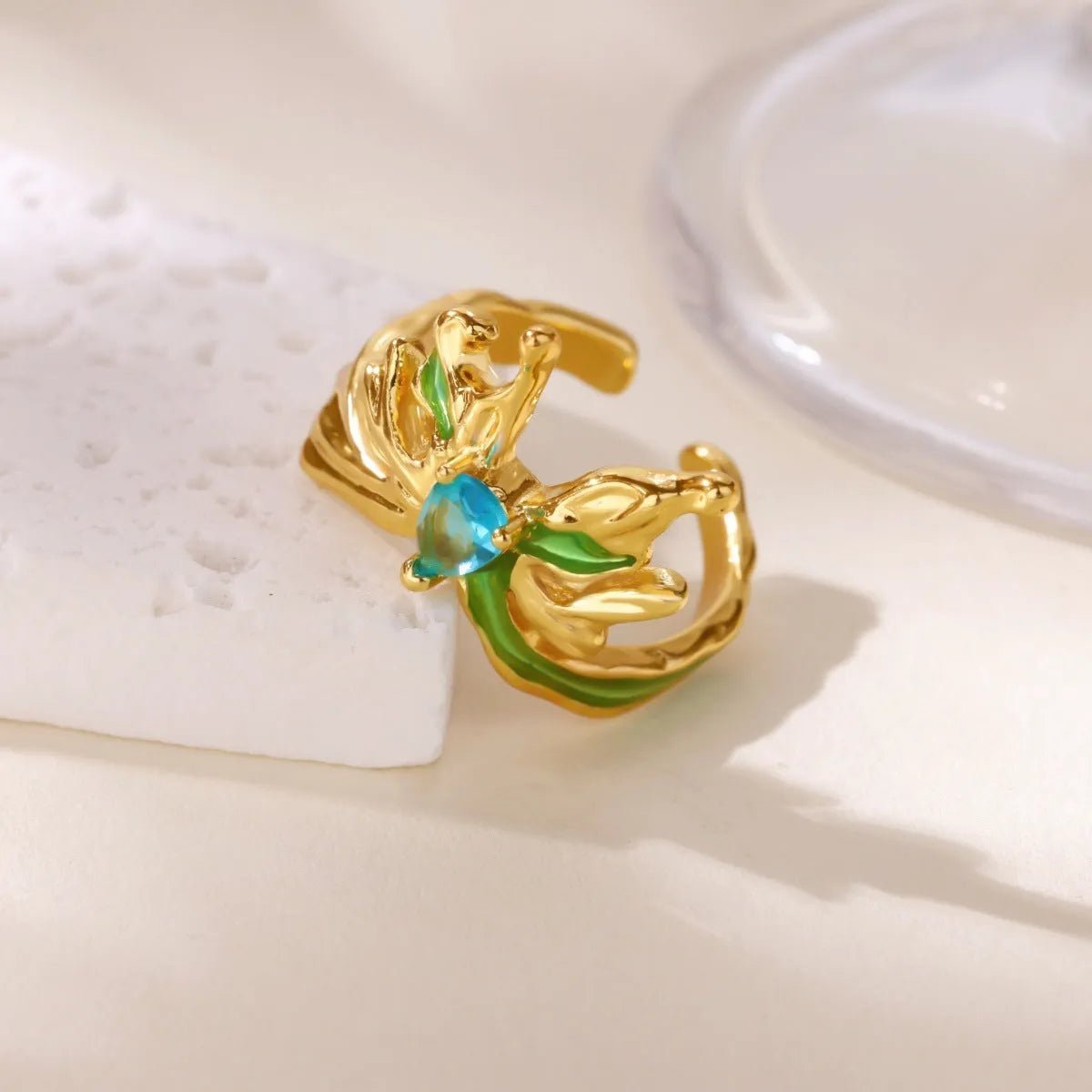 Ice blue oil drop butterfly open ring in copper with electroplated finish