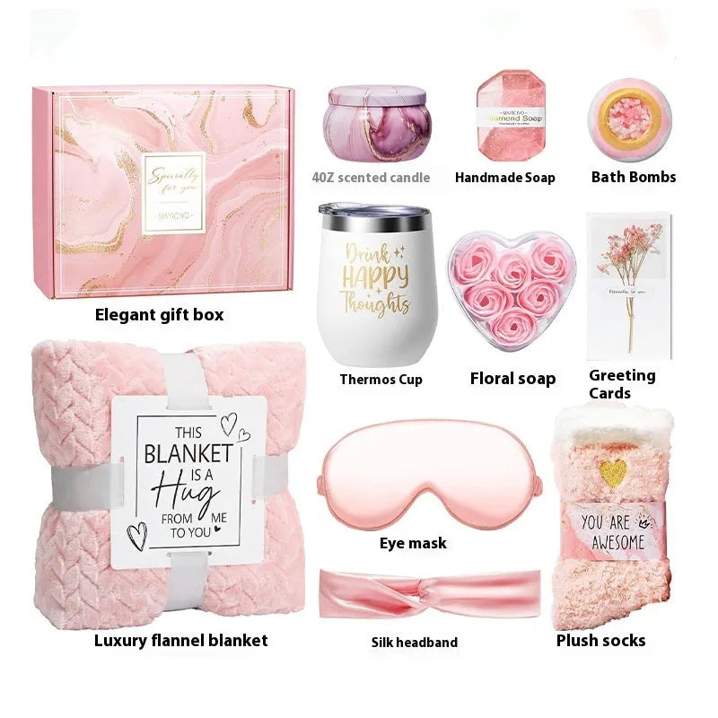 Aromatherapy gift set box containing scented candles, soaps, and bath accessories.