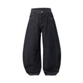 Men's wide leg denim trousers in original cow colour showing relaxed fit and mid waist construction