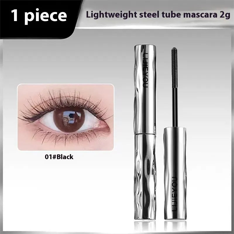 Waterproof mascara in a steel tube with choice of black or brown shade, shown with optional eyelash curler.