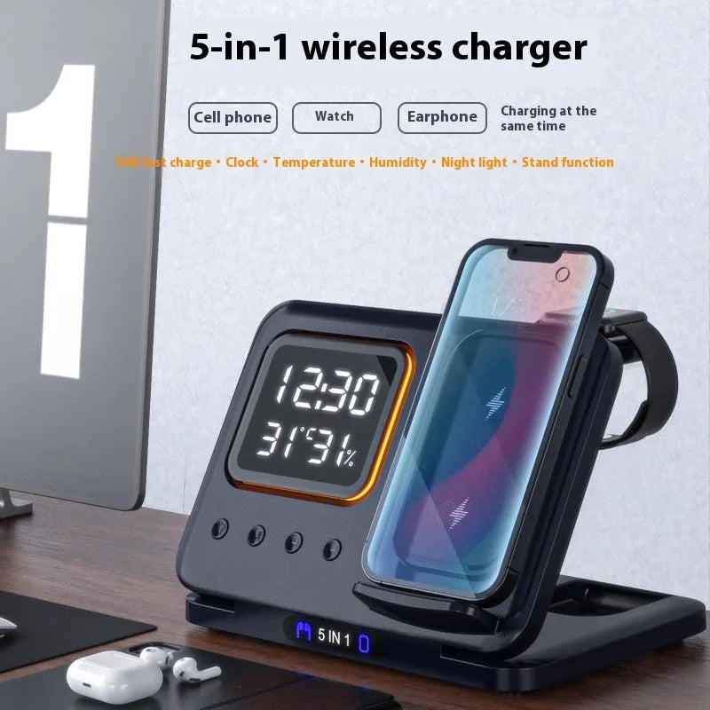 Black and white 5-in-1 wireless charging dock station with phone, watch and earphones charging, showing LED clock display.