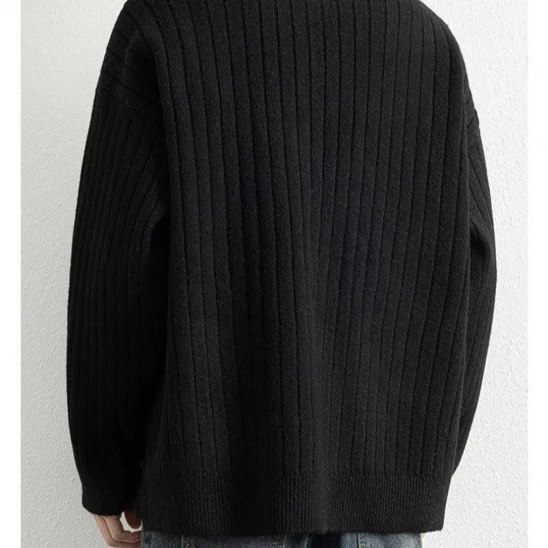 Men's grey half-zip textured knit sweater with loose fit design and long sleeves