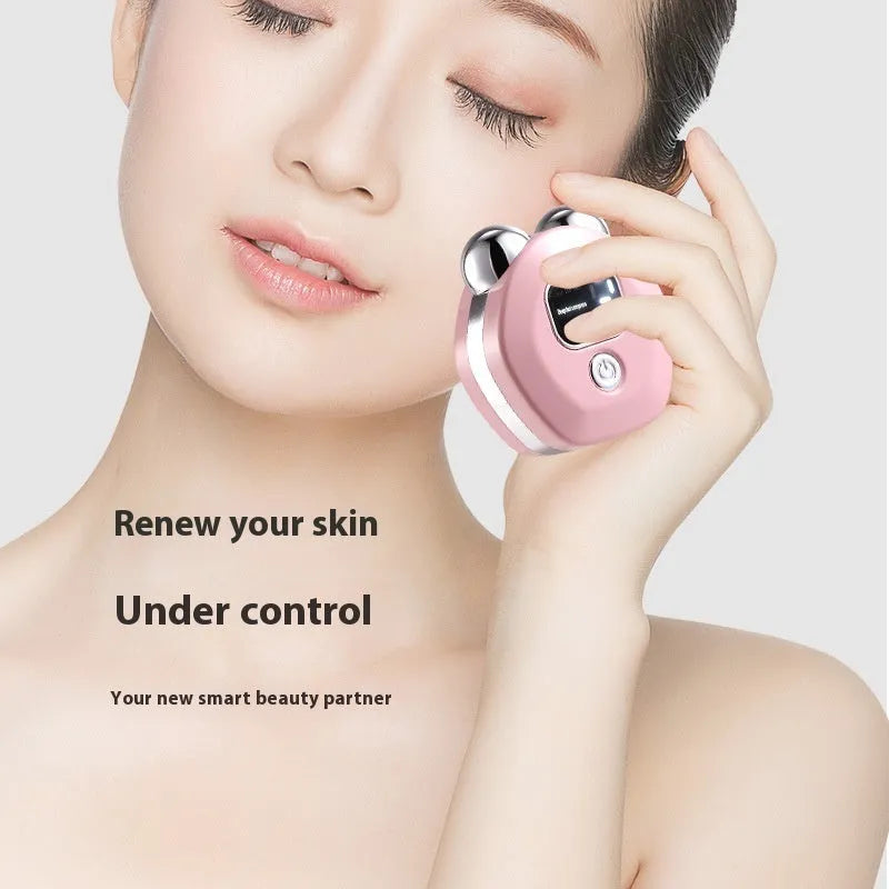 Portable micro current double-roller massage instrument with hot compress function in light blue colour