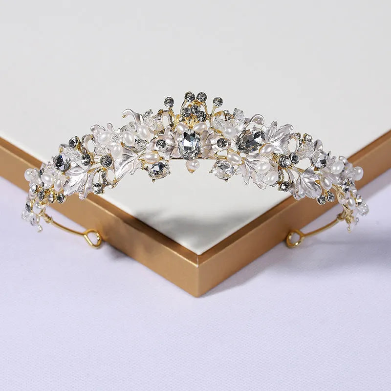 Women's pearl-decorated alloy crown headdress in gold or silver electroplated finish.
