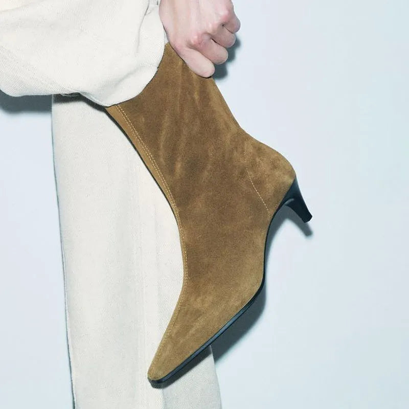 Brown square toe women's ankle boots with a side zipper, kitten heel, and a waterproof platform sole.