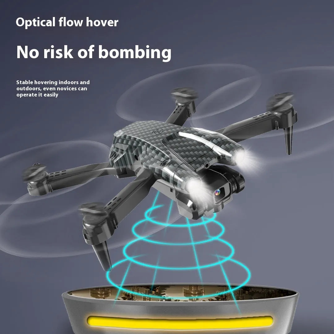 S138 black folding drone with carbon fibre appearance, showcasing folded arms and dual cameras for obstacle avoidance aerial photography.