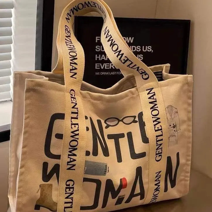 Canvas women's travel tote bag with printing elements and large capacity design