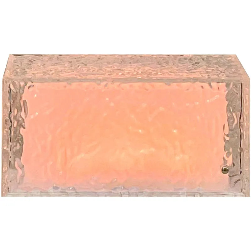 Geometric ice cube acrylic night lamp with multi-colour LED lighting on wooden surface