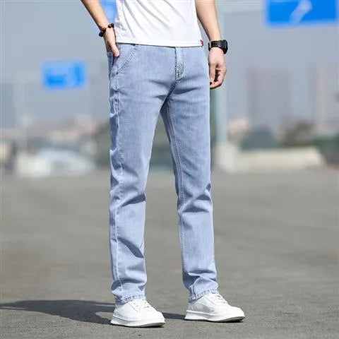 Men's autumn smoky grey straight leg jeans with high elasticity and low waist design
