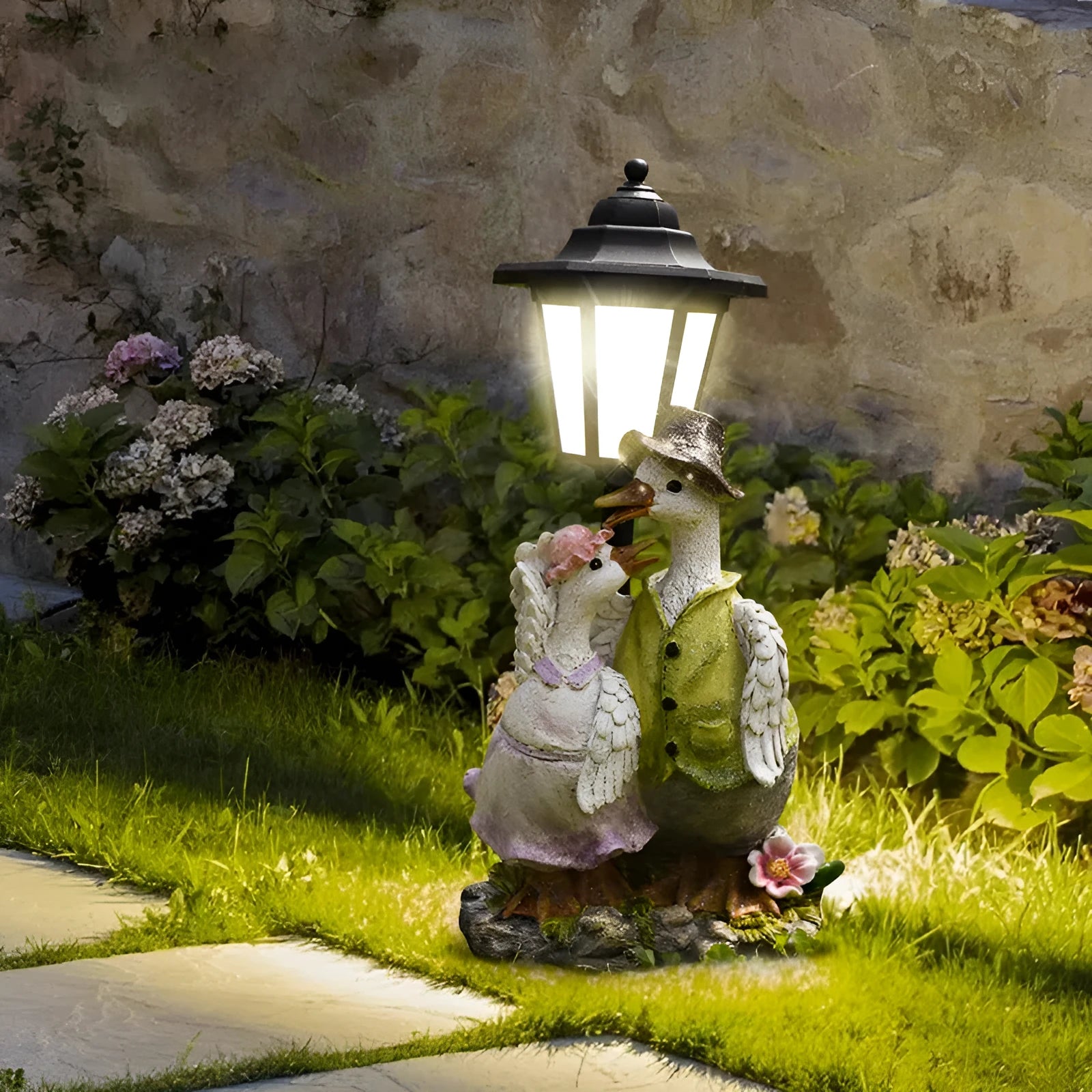Hexagonal solar garden lamp with synthetic resin construction showing animal figurine design options