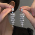 Women's Christmas tree drop earrings with sparkling zircon stones in silver pagoda colour
