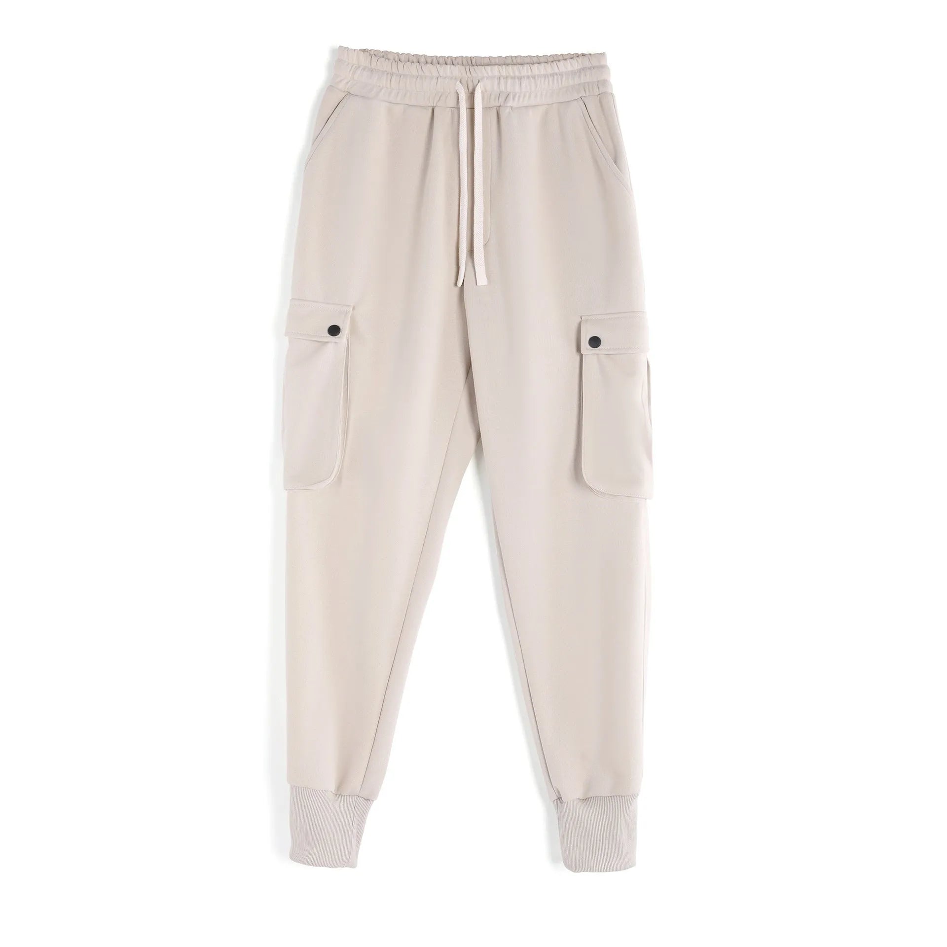 Men's loose cotton trousers with ankle ties in apricot colour showing multi-pocket design