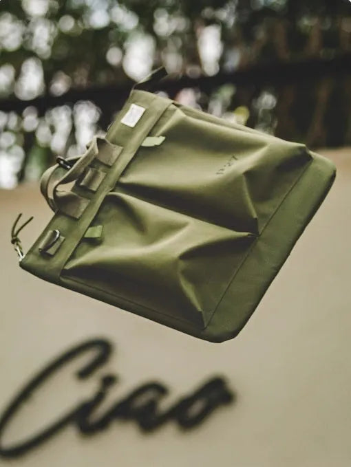 Retro style canvas crossbody messenger bag in charcoal black with zipper closure and shoulder strap