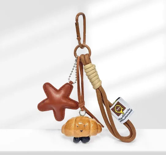 Handmade soda bread style handbag pendant with cartoon food design and brown adjustable carrying strap